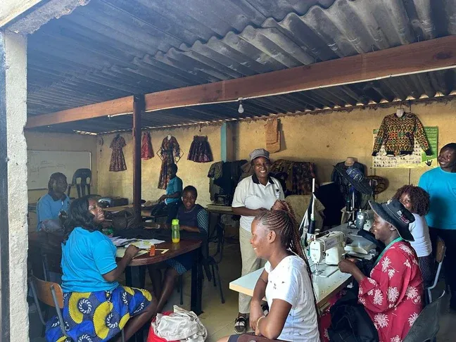 Participants at a sewing workshop