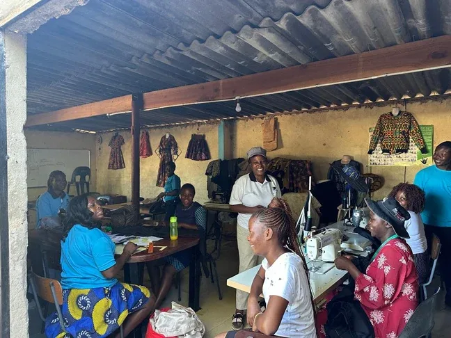 Participants at a sewing workshop