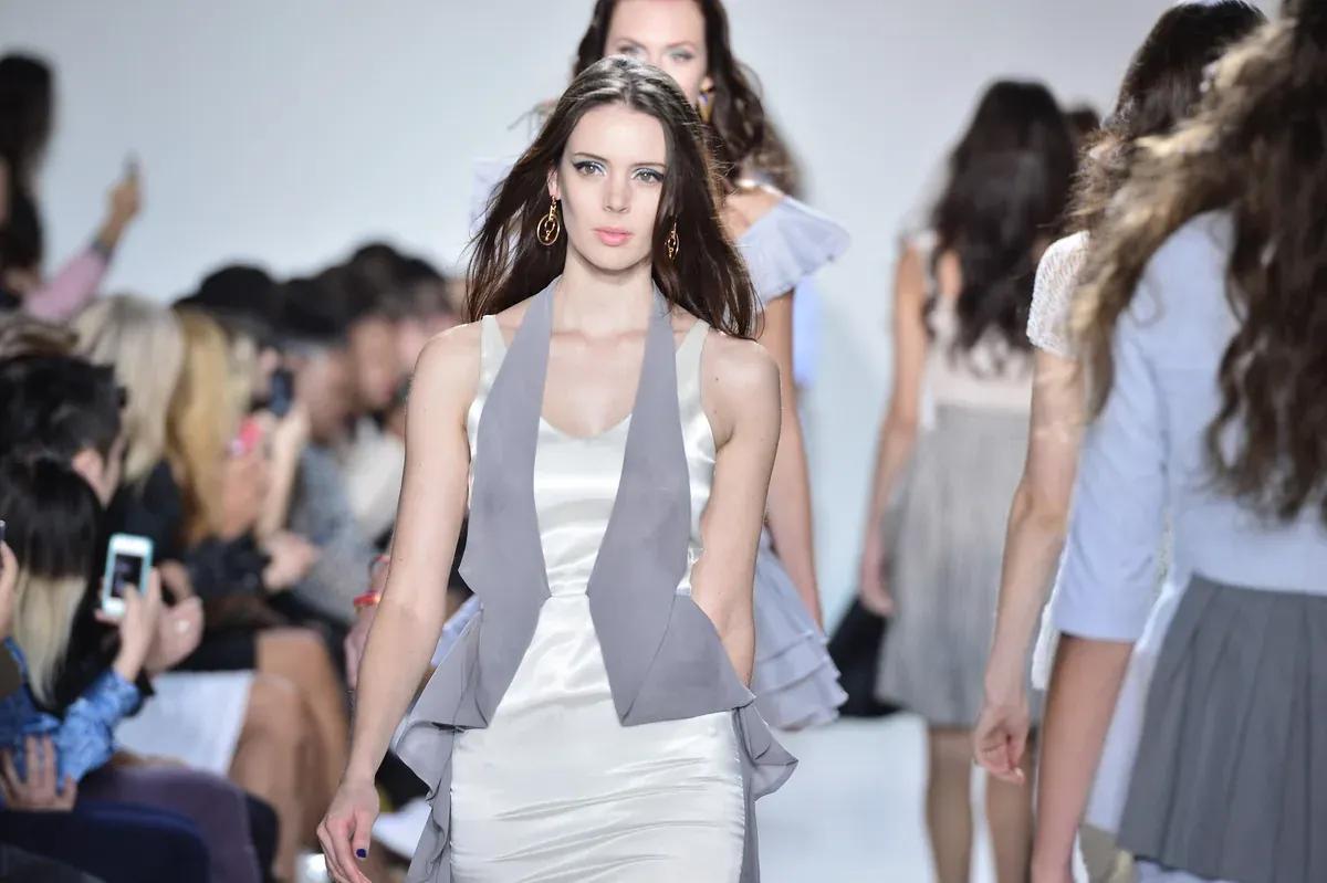 Model in a waistcoat on the runway
